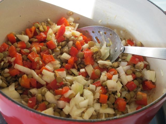 Sauté lentils with onions, peppers and garlic.