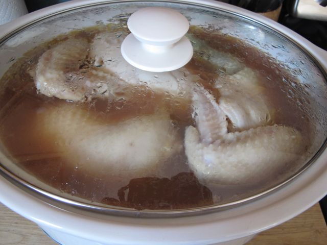 Place the whole chicken in the crockpot.