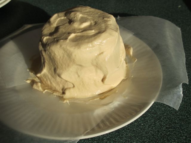 Once covered, remove the wax paper.