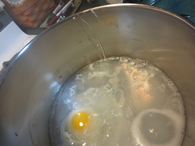 Add egg to boiling water.