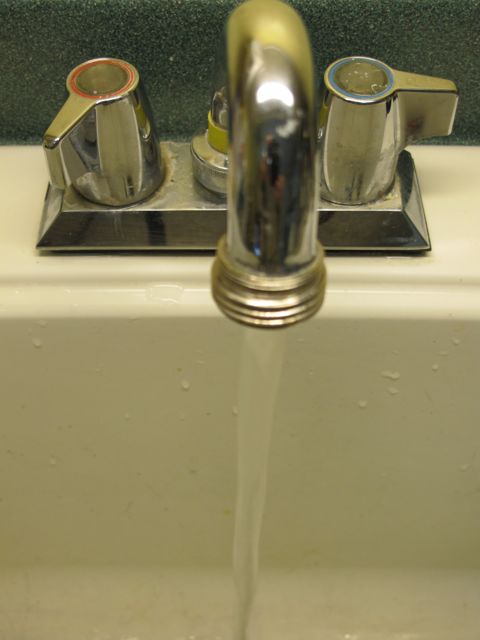 Collecting a water sample.