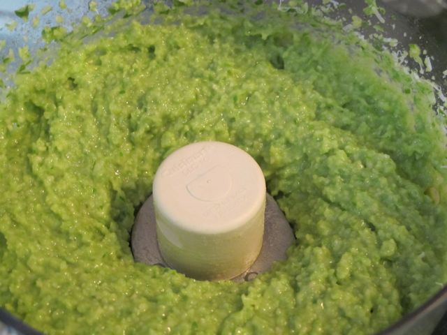 Puree the scapes and the almonds.