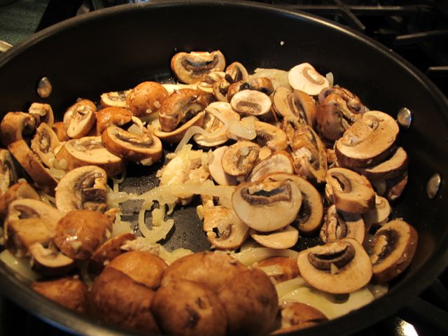 Sautéing mushrooms and onions.