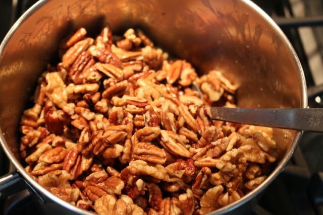 Toss pecans in sugar mixture.