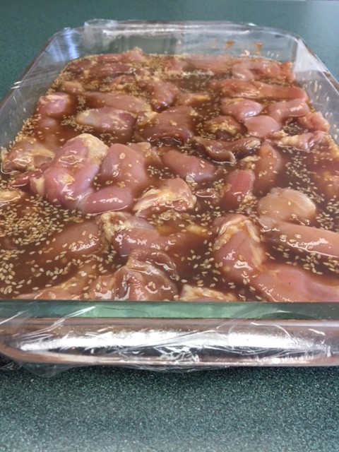 Marinating chicken.