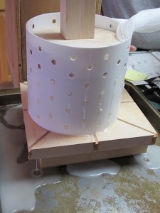 First pressing pressing curds, making cheese