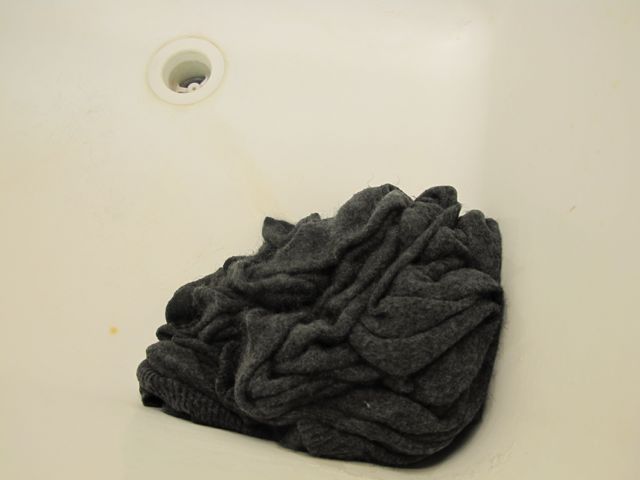 Let the sweater drain.