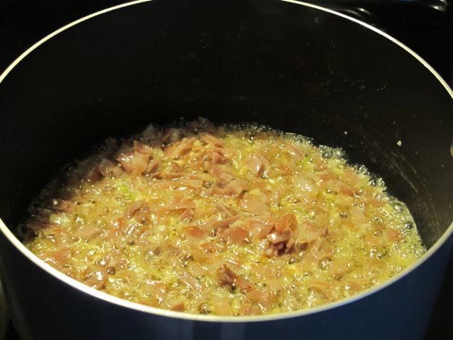 Saute garlic and prosciutto.