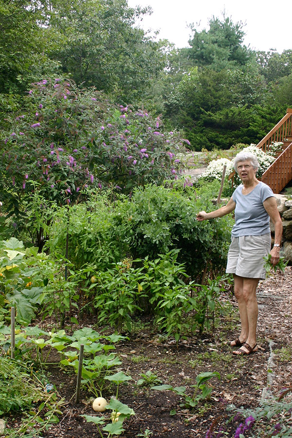My mom in her garden.