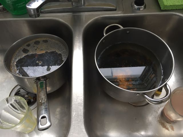dirty pots in the sink