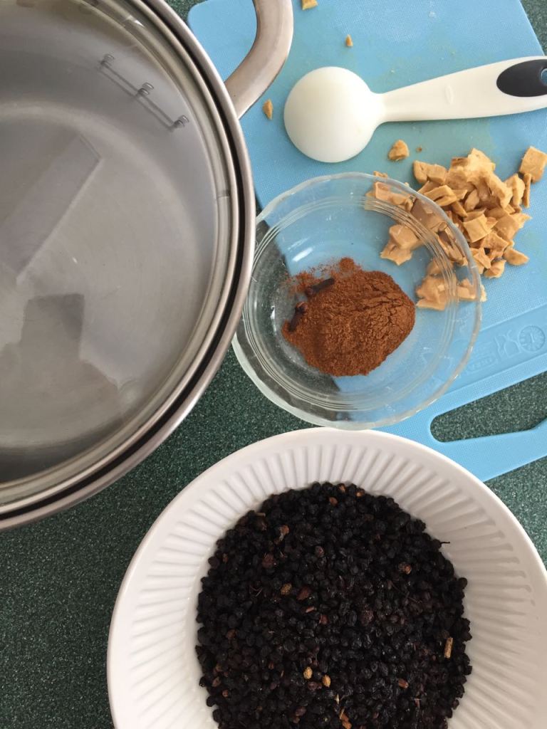 Making elderberry syrup, canning elderberry syrup