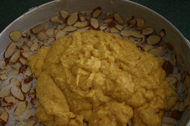 Spread cake batter over almonds. cake, desserts, recipe box