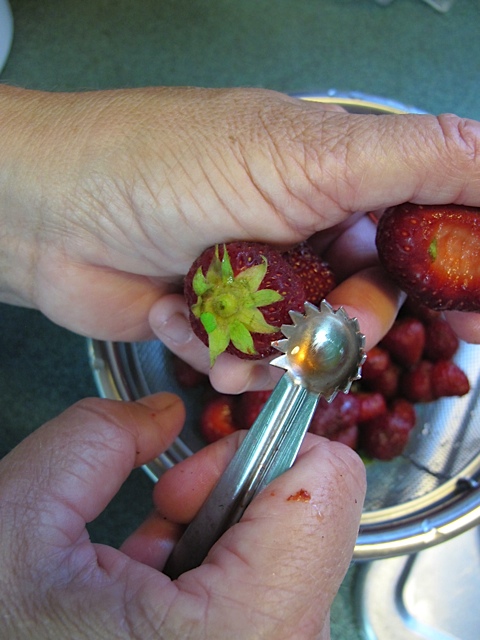 Coring strawberries berries, strawberries, prudent living