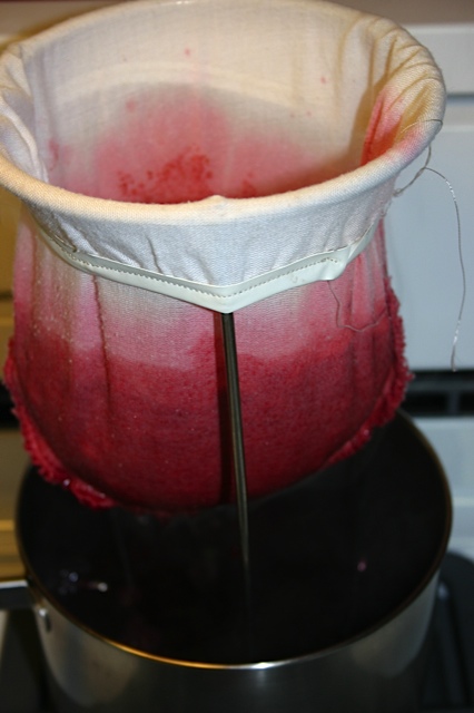 Straining the jelly. jelly, prudent living