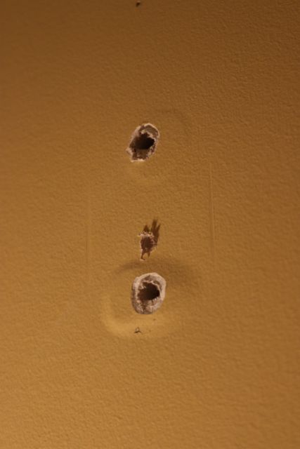 Holes in the wall.