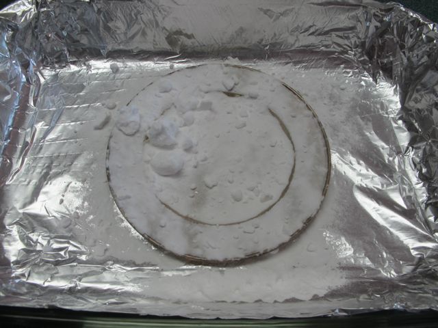 Cover silver with baking soda.