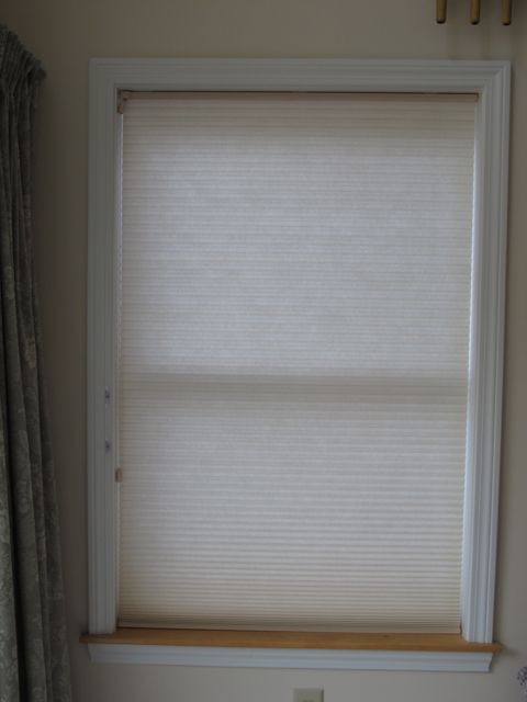 Close the windows and blinds during the day.