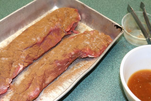 Spread the rub over the pork.