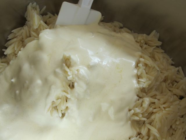 Combine dressing and orzo.