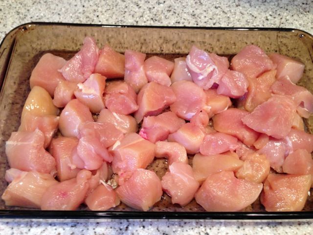 Place cubed chicken in the bottom of the pan.
