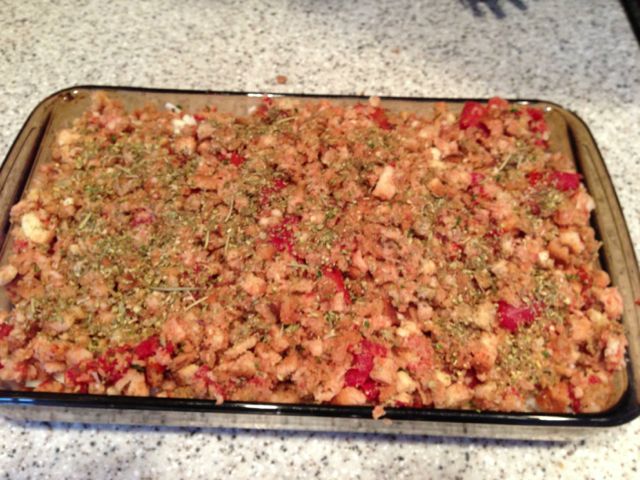 Spread stuffing mix over the chicken.